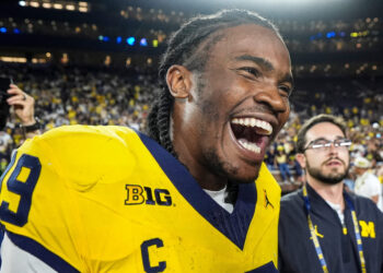 Michigan gets signature win, but big QB questions remain